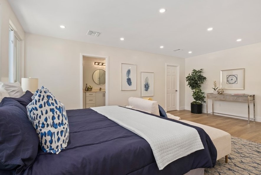 Luxury bedroom with bright, clean finishes